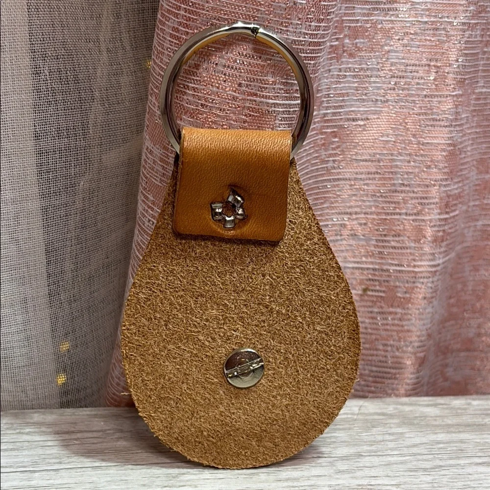 Brown Leather Keychain with Floral Horseshoe Design